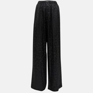 $1600 BALENCIAGA
Logo silk jacquard wide-leg pants size 34